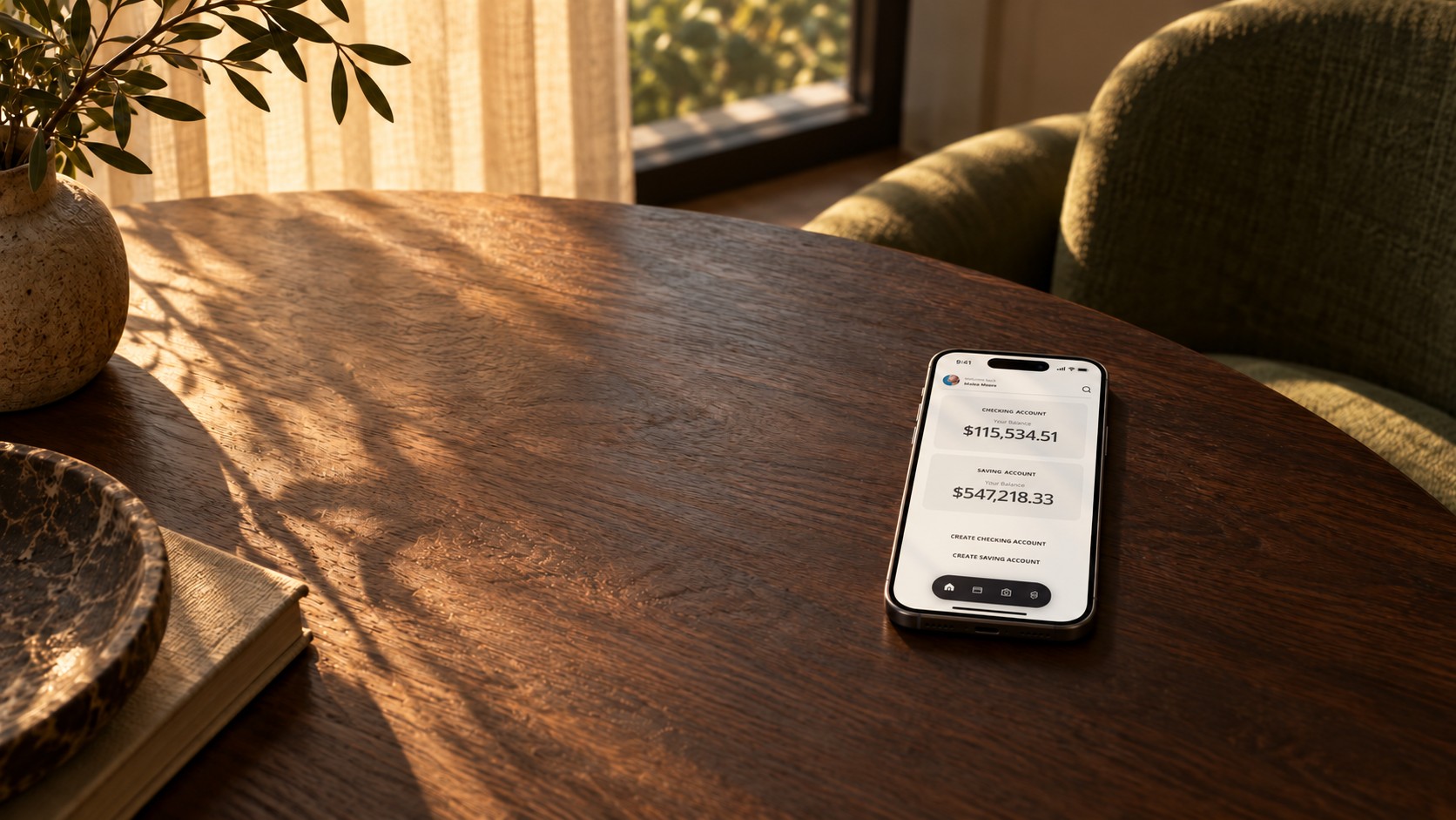 Conceptual editorial photograph of the OneBANK account screen on a phone on a sunlit walnut table
